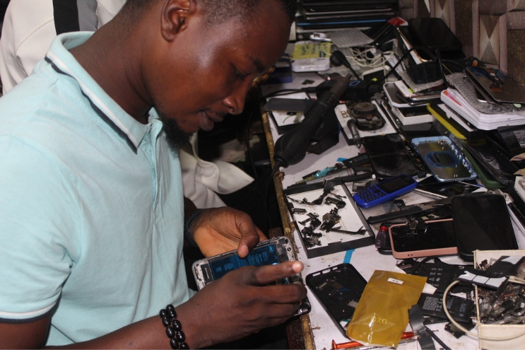 An apprentice of Mr Adeyinka Dada busy at work. Ikeja Record