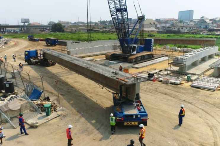 This photo shows the launch of the First Beam over the Opebi-Mende Link Bridge traversing Opebi to link Ojota. Credit: LASG.