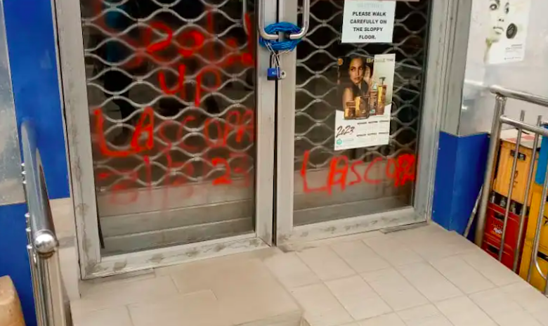 The front door of a supermarket sealed off by the Lagos state government.