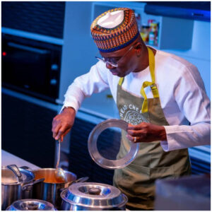 Sanwo-Olu stirs a delicacy in kitchen. Credit: Babajide Sanwo-Olu/X